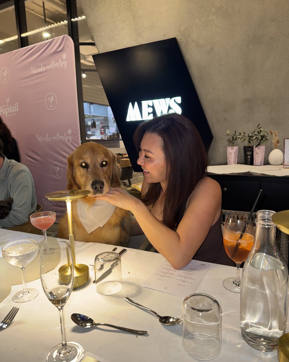 Bentley at the table, cocktails poured