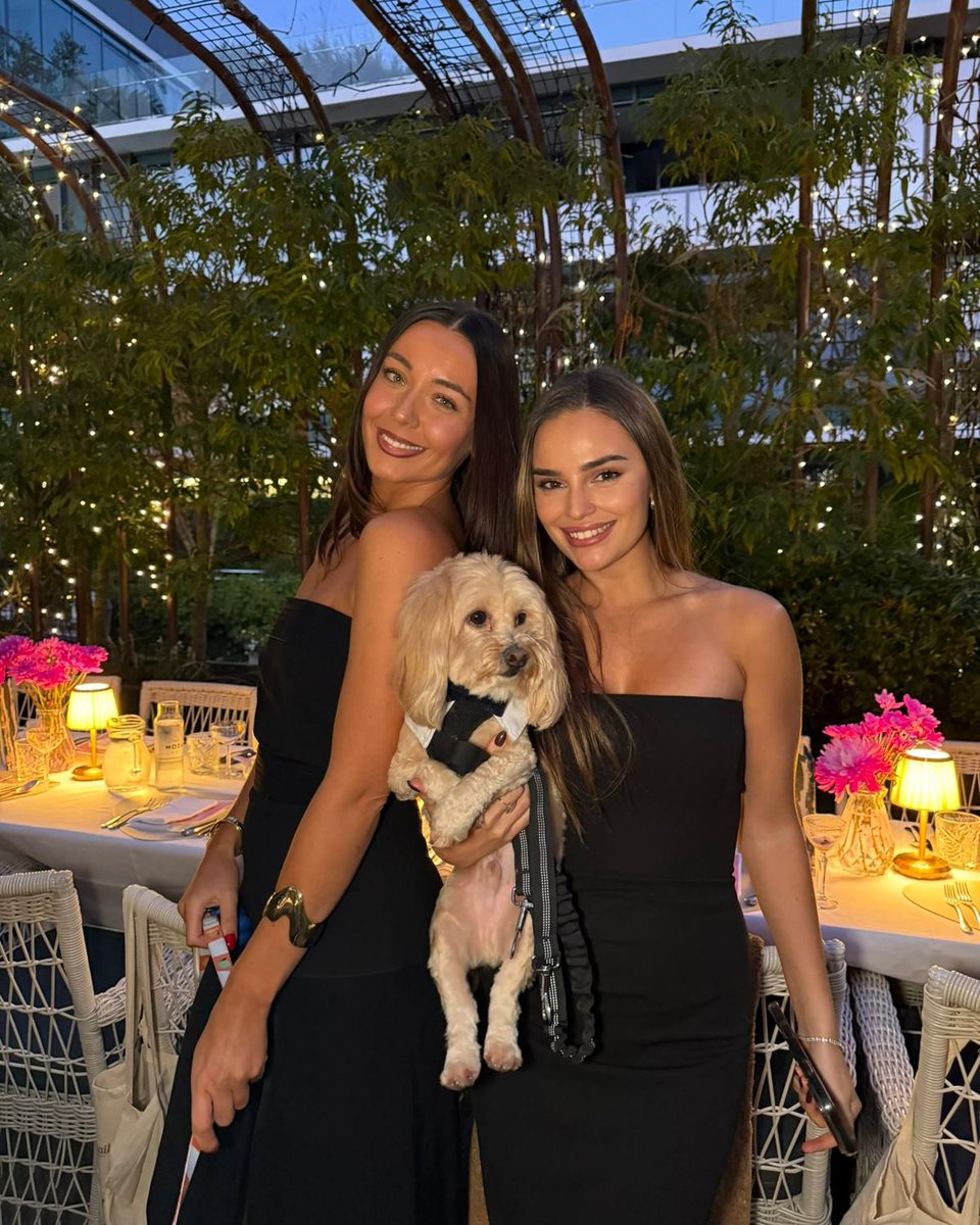 Two guests with their dog at Fine Dining for Dogs in Sydney